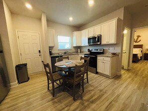 Dining - 4BR WATERFRONT Beach Retreat! Golf Cart, Arcade Room, Heated Pool + Boardwalk (Port St. Joe)