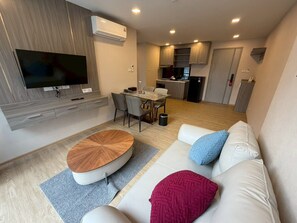 Family Quadruple Room, Balcony, City View | Living area - The Iconic (Muang Pattaya)