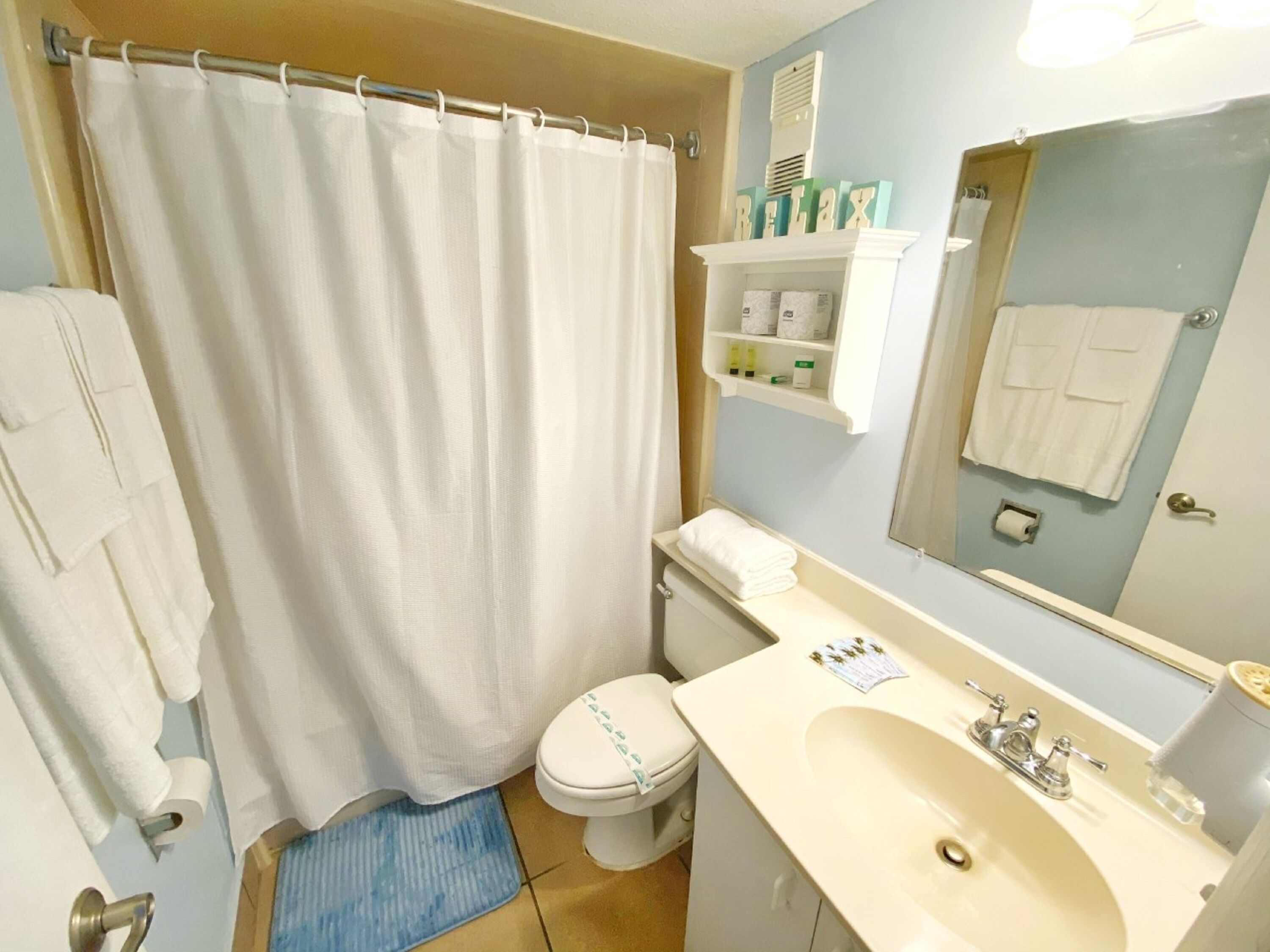 Hair dryer, towels, soap, shampoo