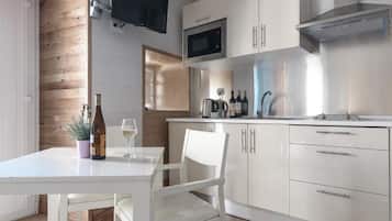 Studio, 1 Queen Bed, Balcony, City View | Private kitchen | Fridge, microwave, stovetop, cookware/dishes/utensils