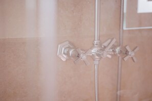 A shower with a control panel and a glass door. - Deluxe Junior Suite with Terrace & Balcony in Sorrento Center (Sorrento)