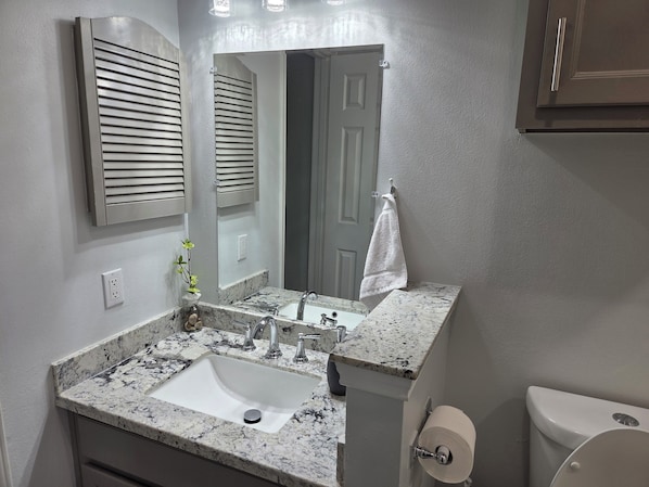 Jetted bath, hair dryer, towels, soap