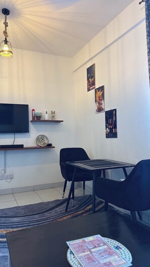 Dining - Buxton 2 bedroom apartment- WITH AC/HOT SHOWER| NETFLIX (Mombasa)