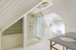 Shower, hair dryer, towels, soap