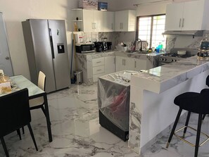 Private kitchen - Charming 2-bedroom House in La Caleta, Dominican Republic (Boca Chica)