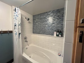 Shower, jetted bath, hair dryer, towels