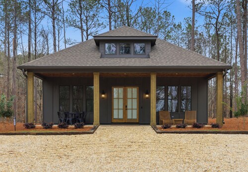Peaceful cabin just off the water at Lake Martin with a designated boat slip.