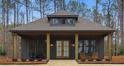 Peaceful cabin just off the water at Lake Martin with a designated boat slip.