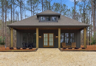 Peaceful cabin just off the water at Lake Martin with a designated boat slip.