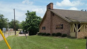 A brick building with a sign that reads 'DC Center & Porter.'