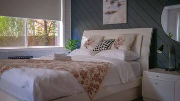 4 bedrooms, iron/ironing board, travel cot, WiFi