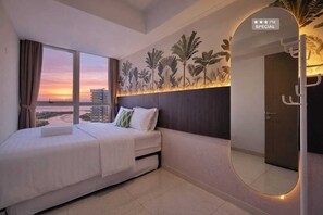 Apartment, 3 Bedrooms, City View | Desk, iron/ironing board, free WiFi - By The Sky By SanLiving - 3BR - PIK (Jakarta)