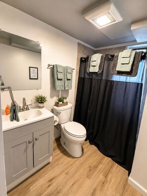 Shower, towels, soap, shampoo