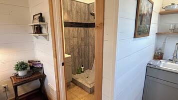 Shower, towels, soap, toilet paper