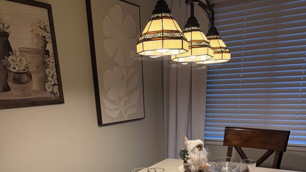 A dining table set with plates, glasses, and a centerpiece. - Garden Estate at the base of the Mountains, sleeps 16, near BYU (Orem)