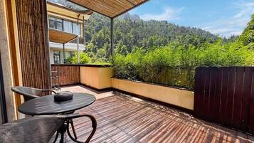 Family Triple Room, Balcony, Courtyard View | Outdoor dining