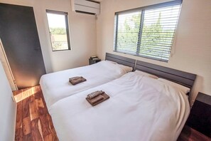 2 habitaciones, tabla de planchar con plancha y internet 