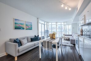 Business Suite, Balcony, City View | Living area - Urban Pulse Suites (Toronto)