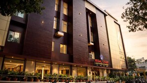 A modern building with a sign reading 'Regal Court.' - Hotel Regal Crest (Bhubaneshwar)