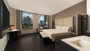 A modern hotel room with a large bed, a desk, a chair, a bench, a small table, a nightstand, a large window with a city view, and a bathtub. - Atour Hotel Shanghai Yuyuan Yaduo  Bund (Shanghai)