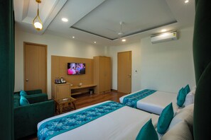Chambre triple Confort | Literie de qualité, lit d’appoint (supplément), accès au Wi-Fi (inclus)