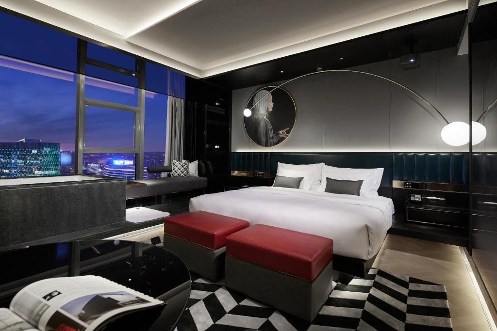 Skyline King Room (Oversized Private Hot Tub) | Down comforters, in-room safe, blackout drapes, soundproofing