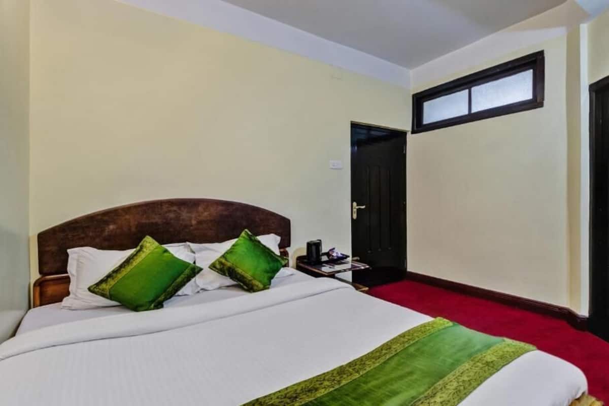 Quarto casal luxo, vista para a montanha