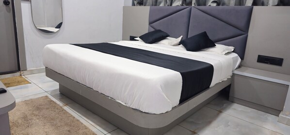 Deluxe Double Room, City View | Desk, laptop workspace, iron/ironing board, free WiFi