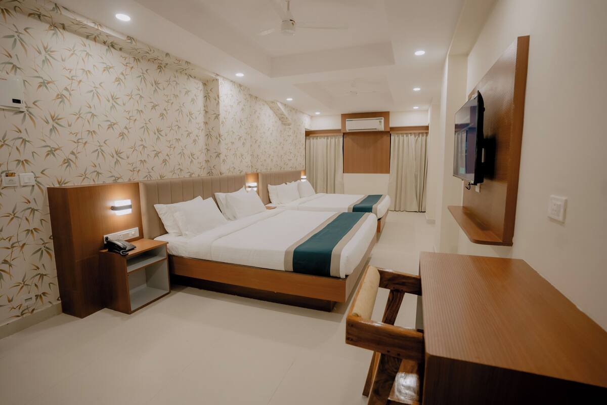 Habitación triple ejecutiva