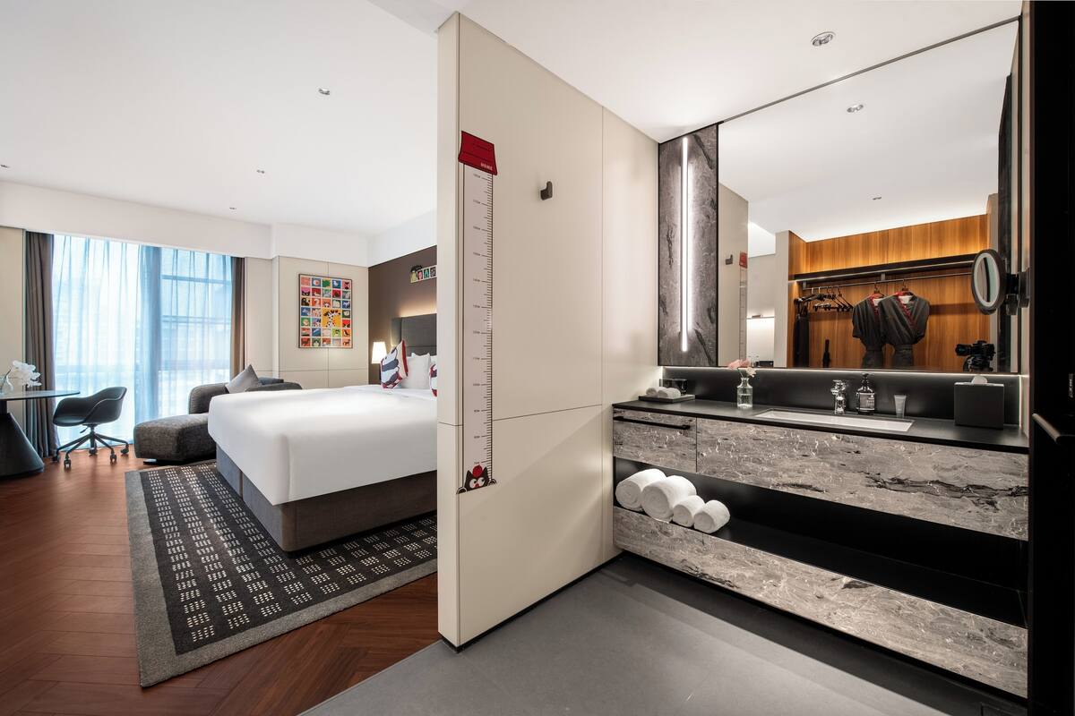 Family Triple Room, City View | Down comforters, minibar (free items), desk, laptop workspace