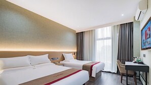 A hotel room with two beds, a desk, and a large window with curtains. - Shankee Hotel (Shunyi)