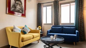 Deluxe-Suite, Gartenblick | Wohnbereich