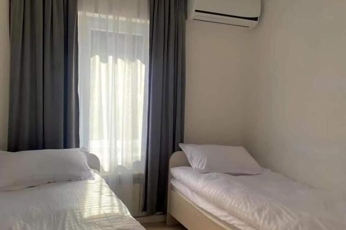 Habitación con 2 camas individuales