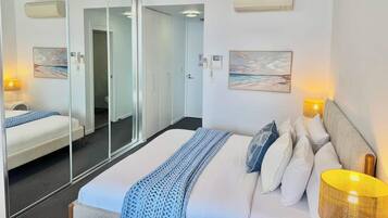 Iron/ironing board, travel crib, WiFi, bed sheets