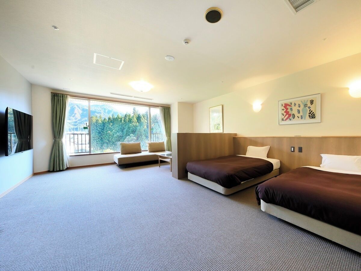 Basic Quadruple Room, Mountain View | In-room safe, free WiFi
