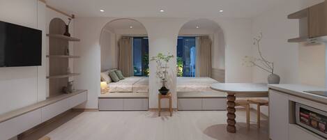 Chambre Prestige, balcon, vue sur la ville | Cuisine privée