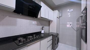 Leilighet – deluxe, balkong, byutsikt | Eget kjøkken