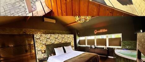 A hot tub, wooden deck, and a bedroom with a bed and nightstand.