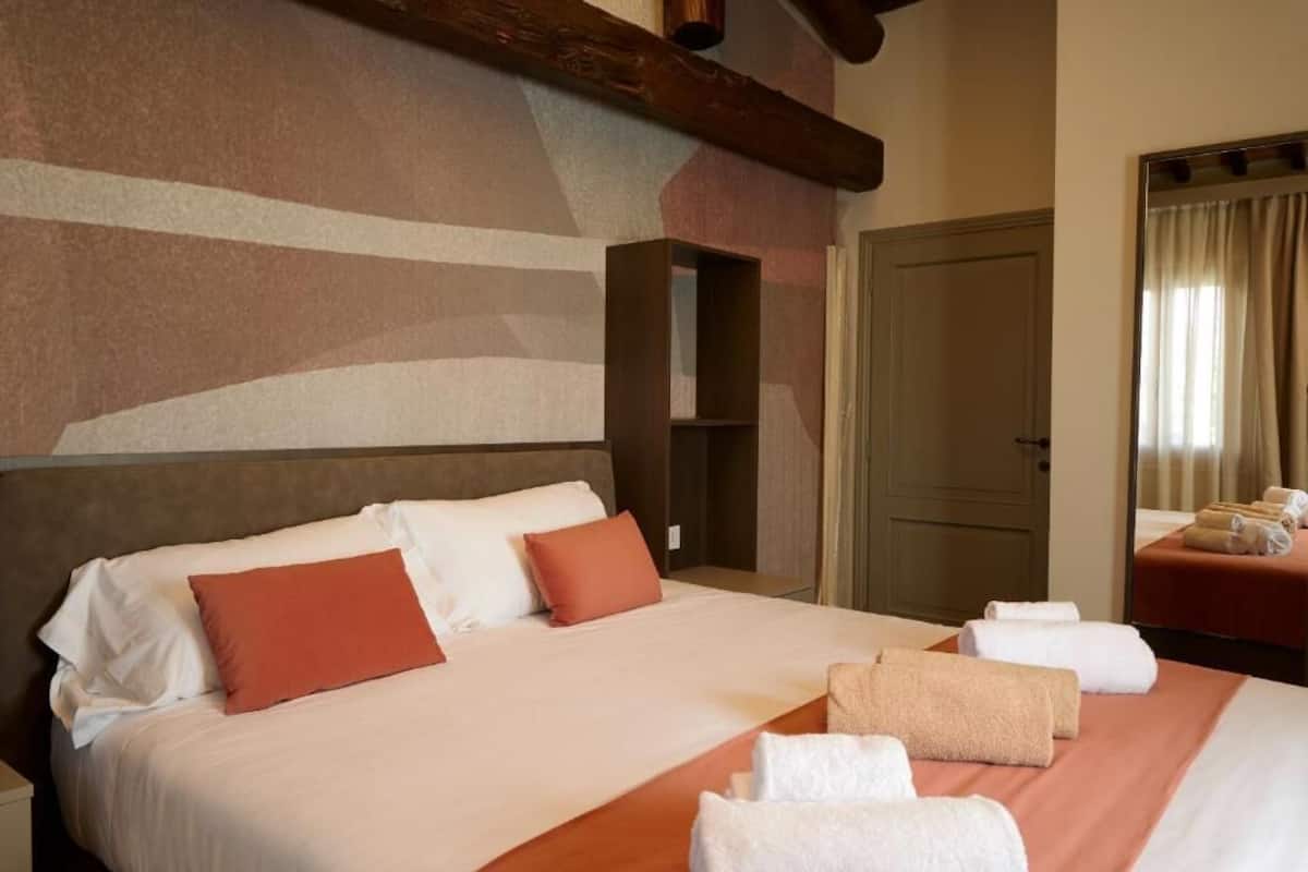 Sviitti, patio, näköala puutarhaan