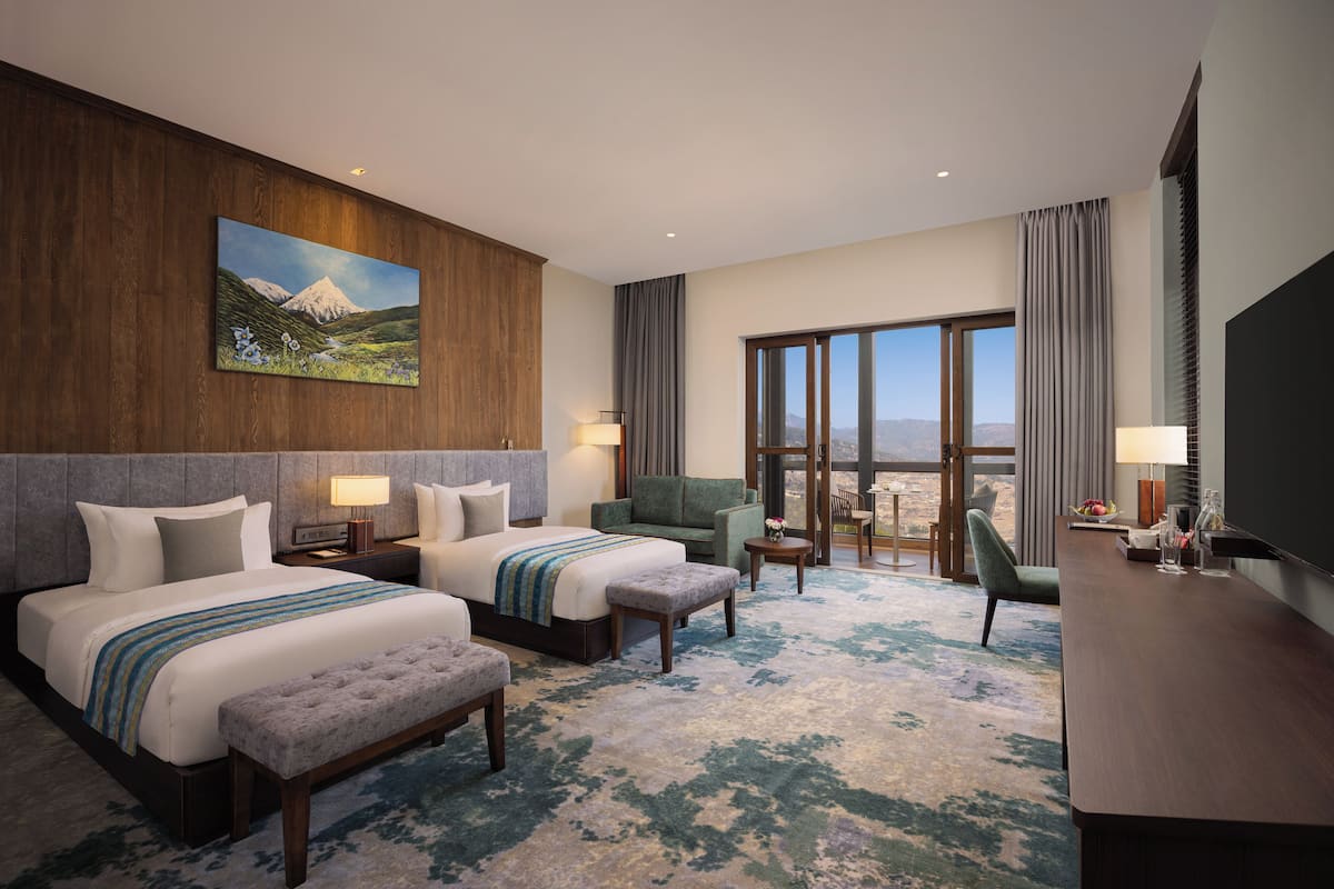 Junior Suite, Balcony, Mountain View | Minibar, laptop workspace, blackout curtains, soundproofing