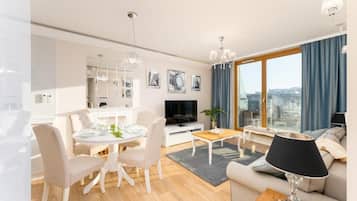 Deluxe Apartment, Balcony | Living area