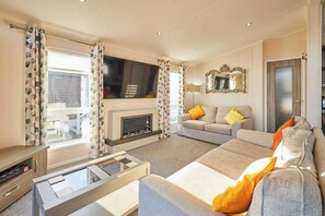 TV, fireplace - Host & Stay | Penny Lodge (Amotherby)