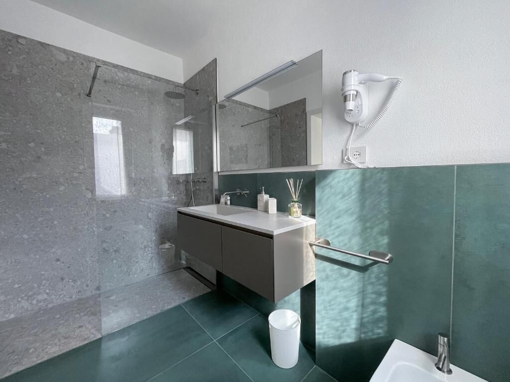 Deluxe-Dreibettzimmer | Badezimmer