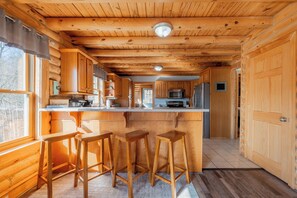 Fridge, microwave, dishwasher, coffee/tea maker - Cozy cabin with mountain views, game room, fire pit, soaking tub, and bright gathering spaces (Christiansburg)