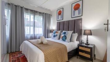 Vila Deluks, patio, pemandangan kebun | Setrika/meja setrika dan Wi-Fi gratis