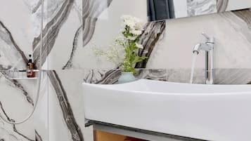 Basic Double Room, Courtyard View | Bathroom | Hair dryer, slippers, towels, soap