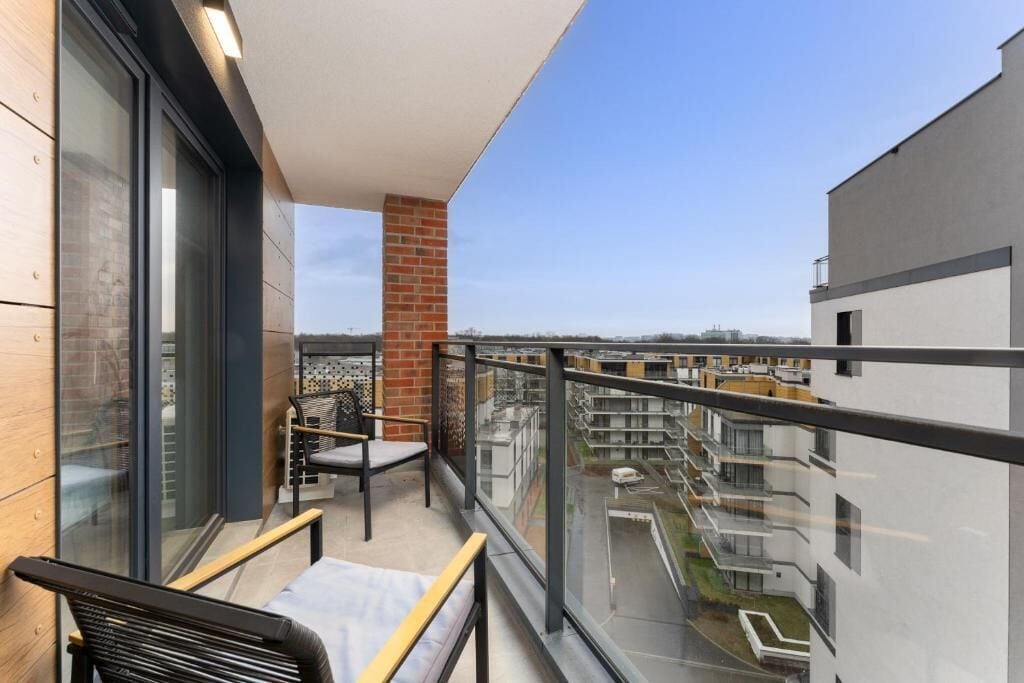 Apartemen Comfort, balkon, pemandangan kota | Halaman properti