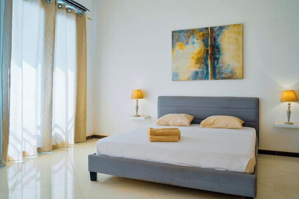 2 dormitorios, tabla de planchar con plancha, wifi y ropa de cama