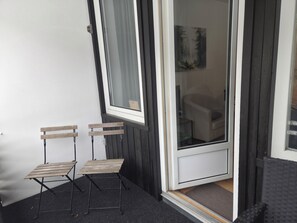 Terrace/patio - Haus Jörn, Ferienapartment Eule mit eingezäunten Garten (Walkenried)