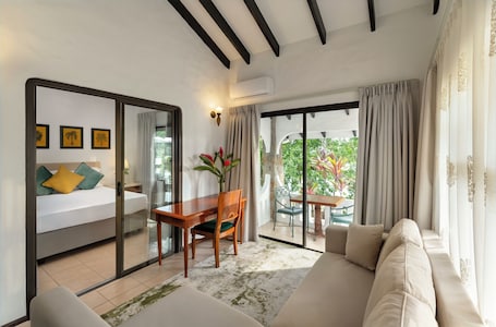 Deluxe Double Room | Living area. Eden’s Holiday Villas
